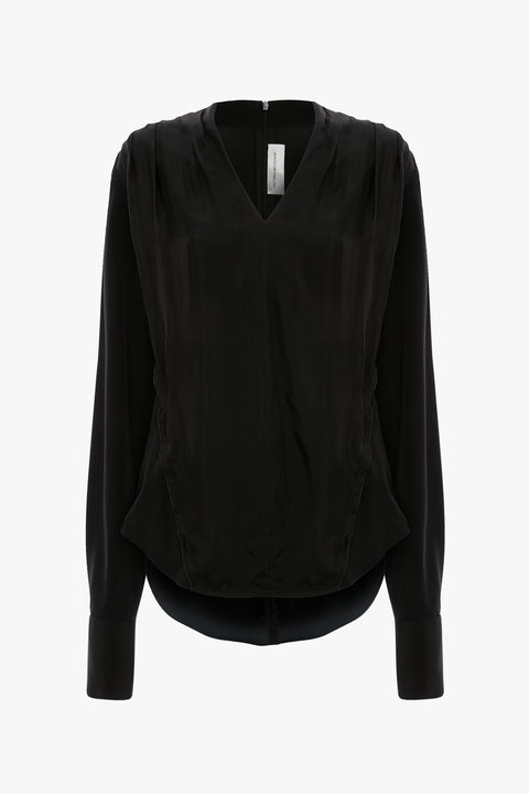 Black v-neck long sleeve silk blouse on a white background