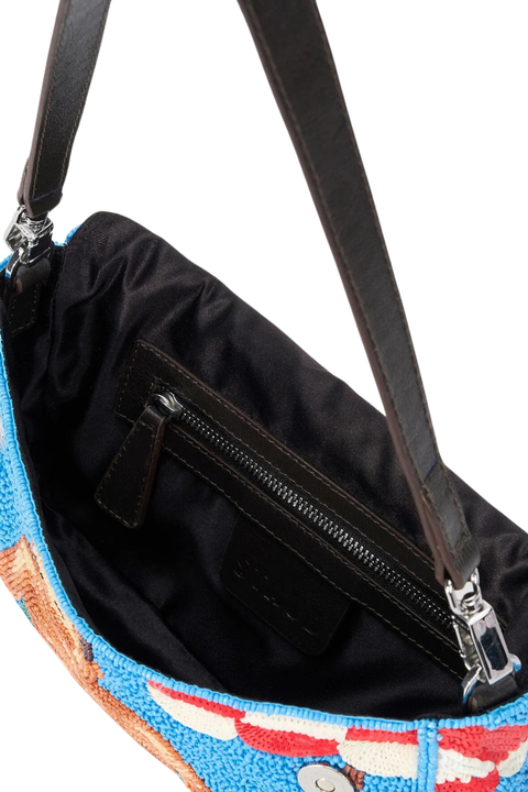 Beaded clutch with a convertible strap for a shoulder bag inside angle