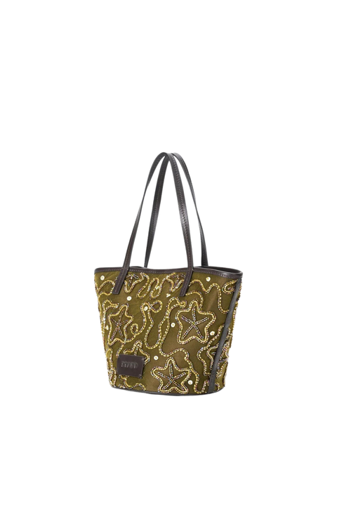Gold and green star-patterned handbag with black handle on a white background side angle