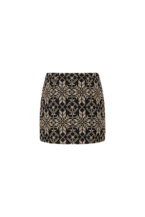 A mini skirt with a black and beige geometric pattern, shown against a plain white background.