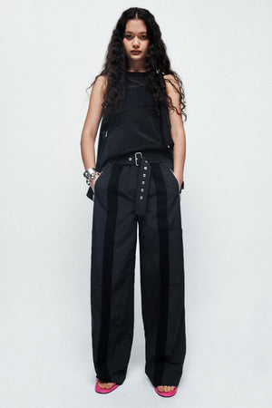 Model styled wearing the black cotton voile tank with smocking.