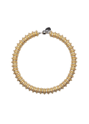 Gold beaded necklace on a white background