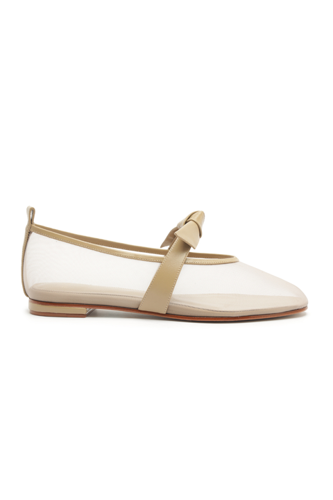 Mesh ballet flat with a tan strap on a white background