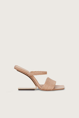 Side profile of a raffia heel that features a gold-toned suspended, geometrical heel and two slide straps.