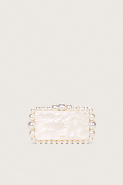 A white marbled acrylic, rectangular clutch with matching beads in graduating size lining the clutch.