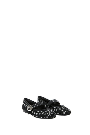 Black ballet flat shoes with silver stud floral patterns on a white background.