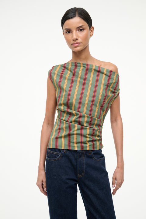 Woman wearing a striped top and jeans on a white background