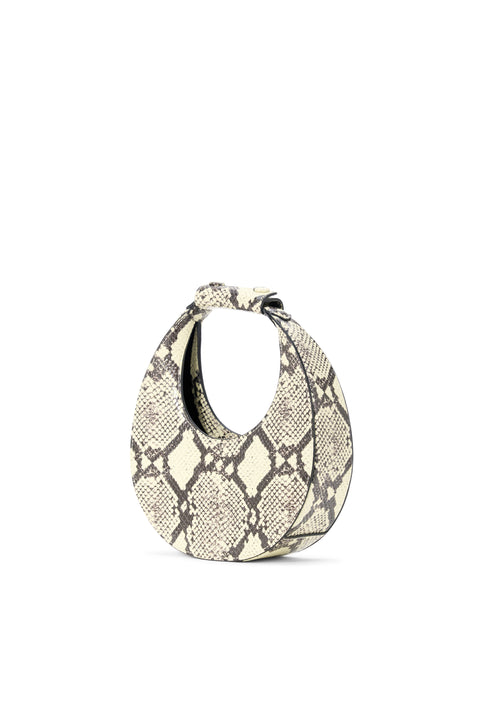 Snakeskin pattern handbag on a white background
