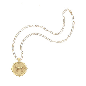 Gold coin pendant with a horse on a gold chain.