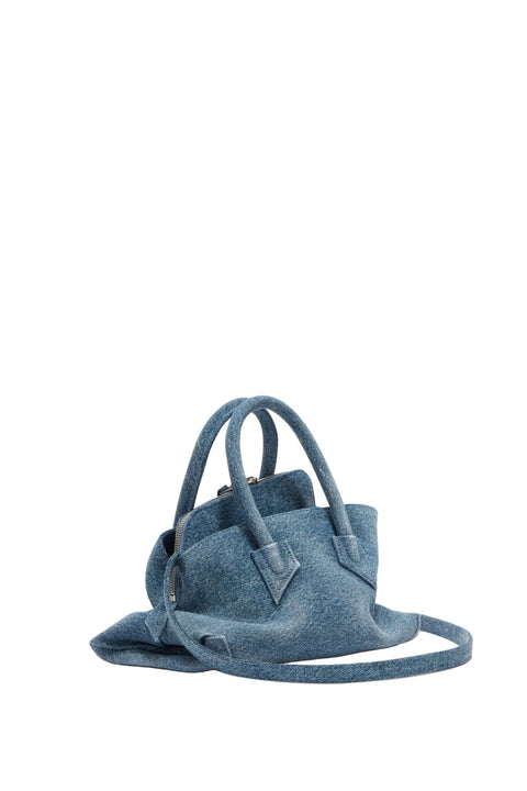 Blue denim handbag on a white background