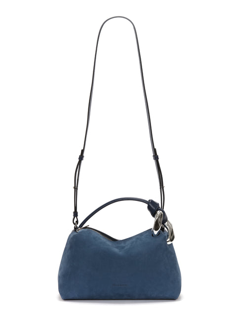 Blue jwa corner bag with crossbody strap extended above.