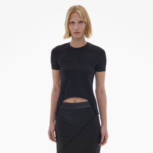 Model wearing the black cutout tee in black