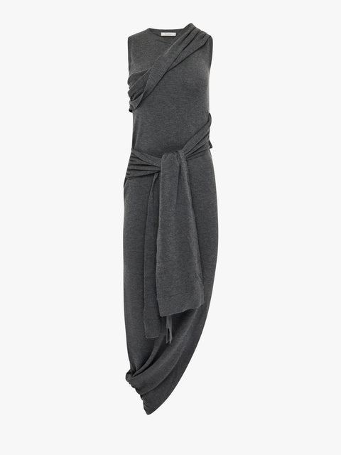 Gray sleeveless dress with a draped design on a white background