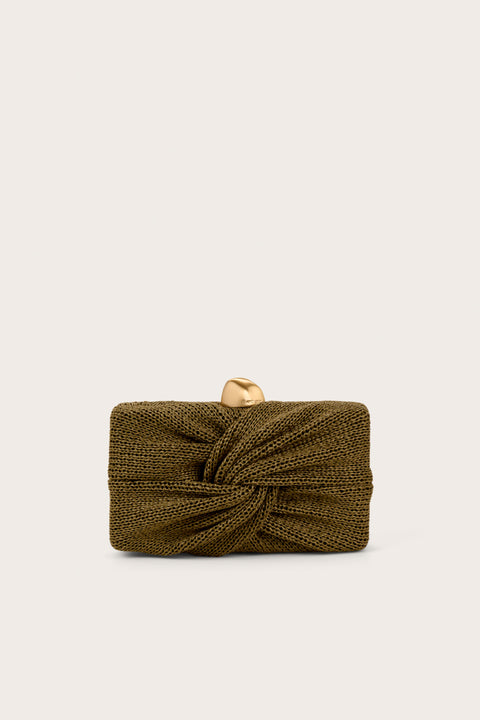 Dark green clutch that features a knotted straw detail and abstract gold hardware.