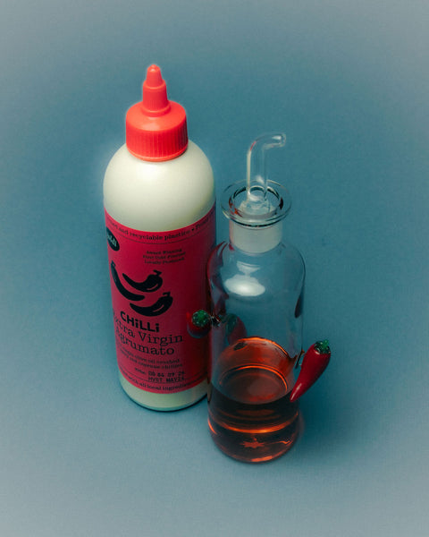 Chili oil bottle with glass chili bottle.