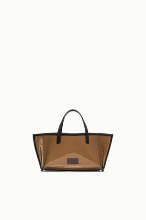 A transparent brown mini handbag that features brown leather trim and handles.