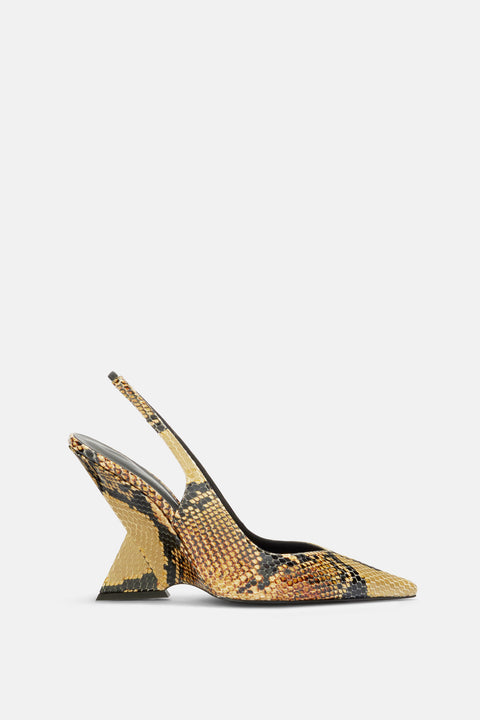 Side profile of a tan and black python printed heel that features an angular pyramid wedge and slingback design.