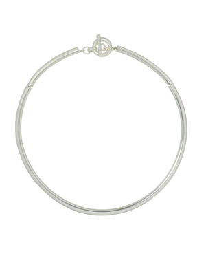 A silver-toned, tubular collar necklace with a toggle clasp.