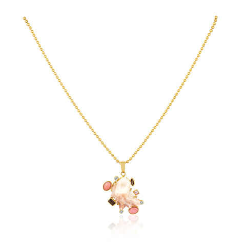 Gold necklace with a pink shell pendant on a white background