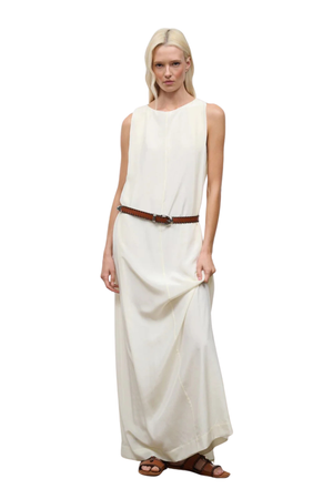 Woman wearing a long white dress with a brown belt on a white background front angle