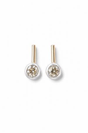 Pair of diamond stick stud earrings on a white background