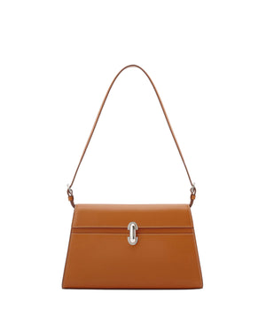 Brown handbag with a silver clasp on a white background
