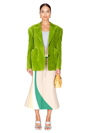 Model wearing the green puff pocket jacket.