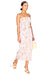 Model walking in the smocked floral print midi dress