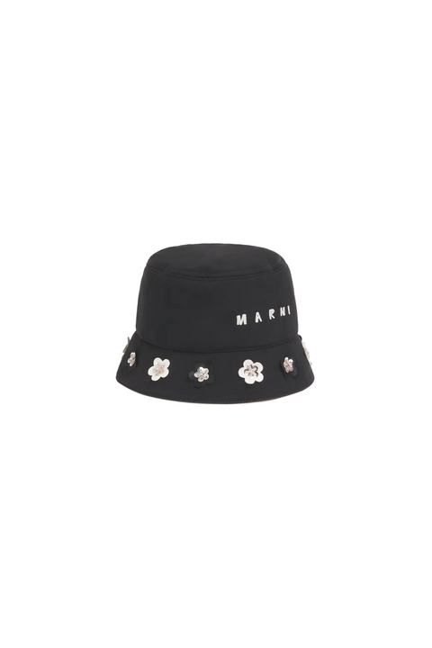 Black bucket hat with floral embellishments and 'Marni' branding on a beige background