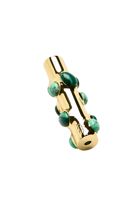 Gold lighter case with green colored stones