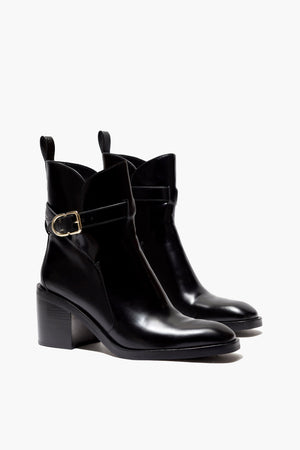 Ghost image of alexa boots in black with ankle strap.