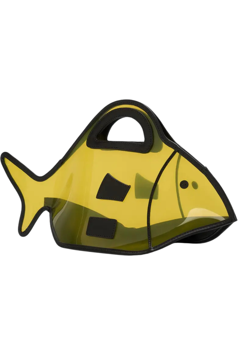 Yellow clear fish-shaped bag with leather accents on a white background
