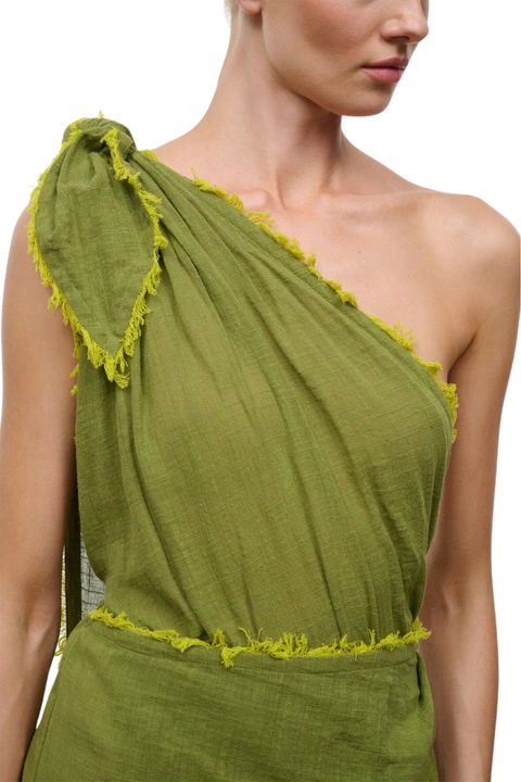 Woman wearing a green one-shoulder midi cover up dress close up angle
