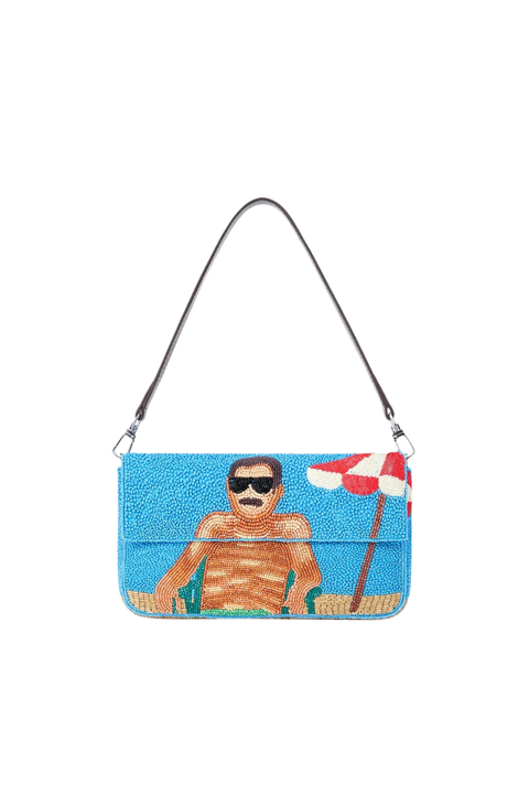 Beaded shoulder bag clutch with a design of a person sunbathing under an umbrella on a blue background