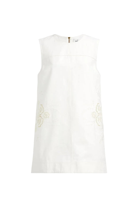 White sleeveless mini dress with lace details on a white background
