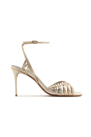 Gold high-heeled sandal with open design on a white background