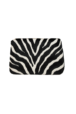 Ghost image of a flat black and white zebra print travel pouch with a zipper top closure on a white background. 
