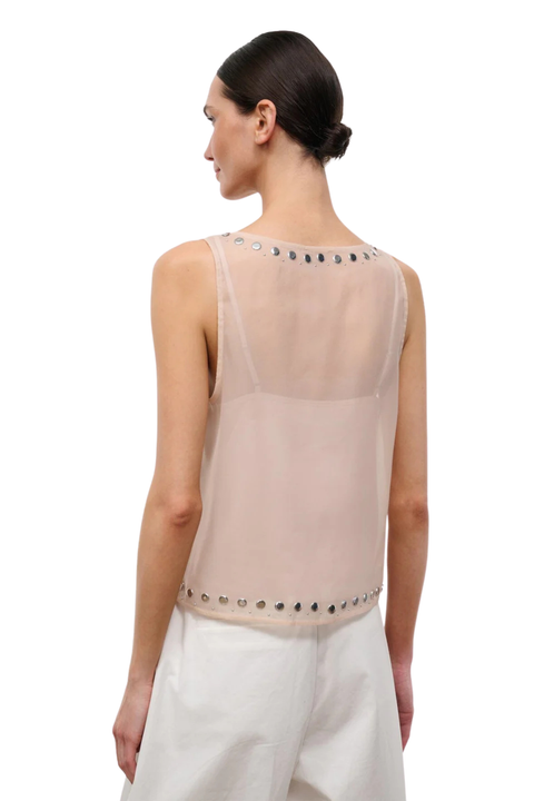 A woman wearing a pink sheer organza sleeveless top with stud embellishments back angle