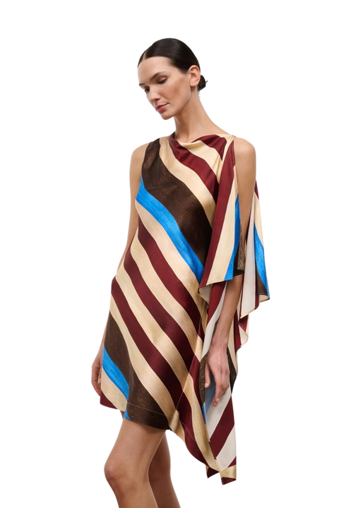 A model wearing a sleeveless, draped mini dress with diagonal stripes in brown, beige, burgundy, and bright blue, set against a plain white background.
