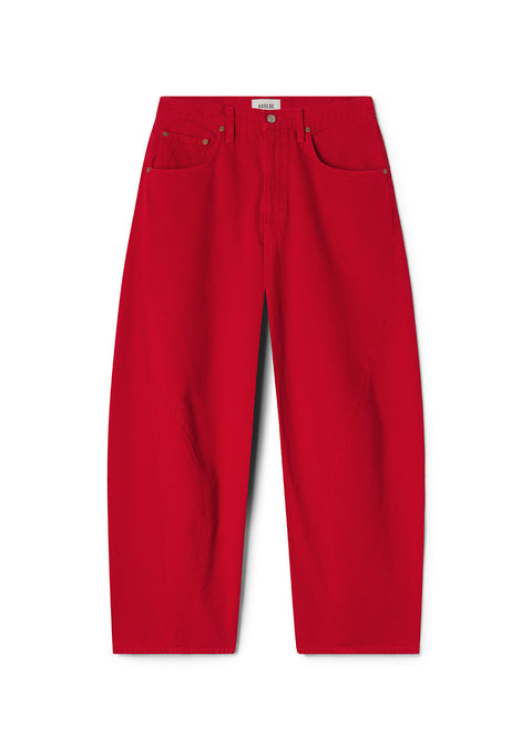 Red wide leg jeans on a white background