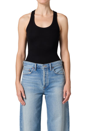 Black bodysuit and mid-rise light washed denim