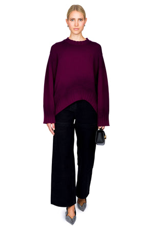 Round Neck Sweater With Uneven Hem
