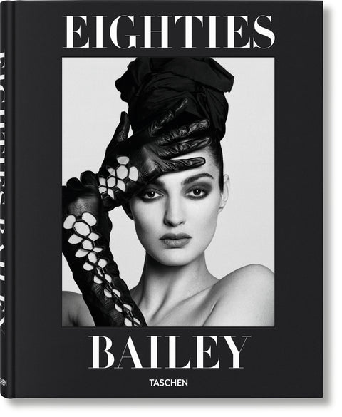 Cover of a black coffee table book titles "Eighties Bailey" with a picture of a woman on the front. 