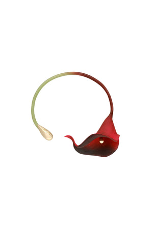 Red calla lily-shaped necklace on a white background