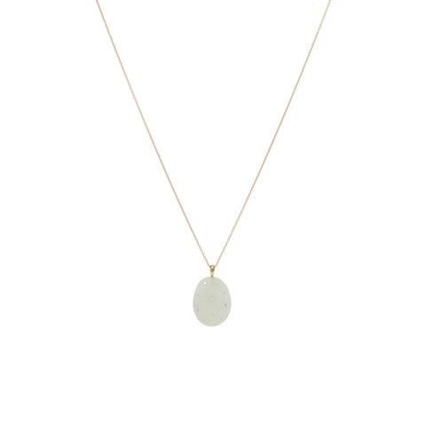 A white, oval stone embellished with miniature round diamonds, suspended on a gold chain. 