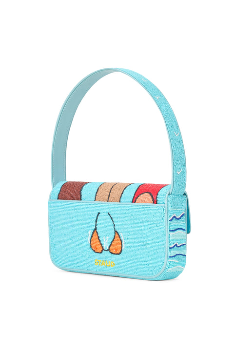 Back of a blue Staud Tommy bag with a ab bikini top design. 