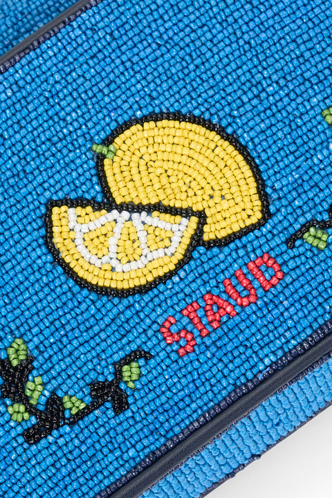 Blue beaded pouch with lemon design and 'STAUD' branding