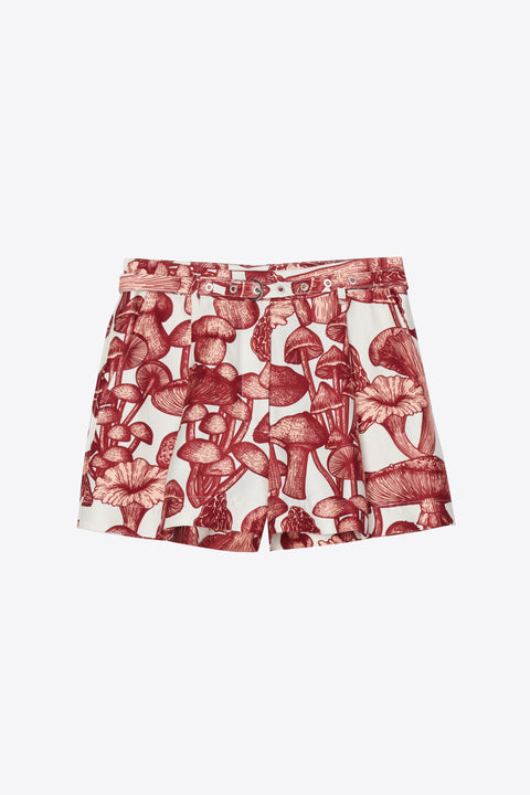 Red mushroom print shorts with matching grommeted belt.