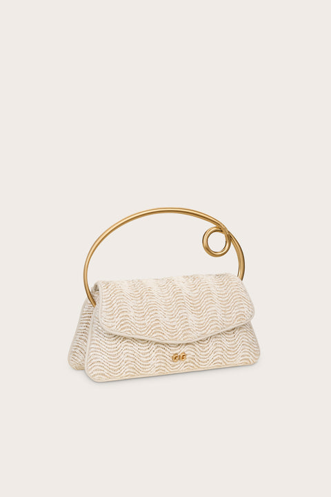 Side-facing off-white handbag constructed from a textured wave material with gold-toned hardware, including a rounded handle with a loop. 