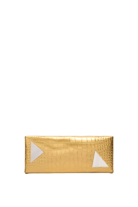 Gold clutch bag with white accents on a light gray background